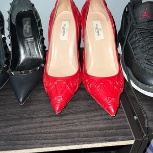 Sold “Valentino Garavani like new red swirl 37.5
